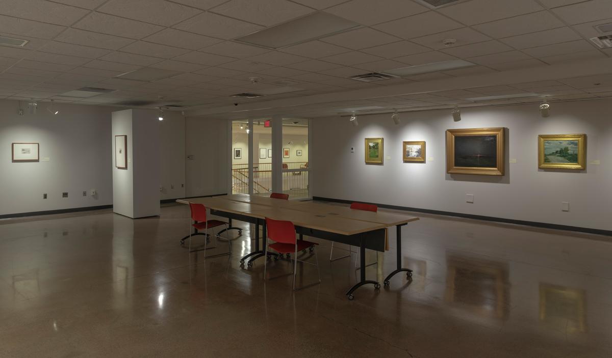 The Tweed study room with art displayed on the walls.