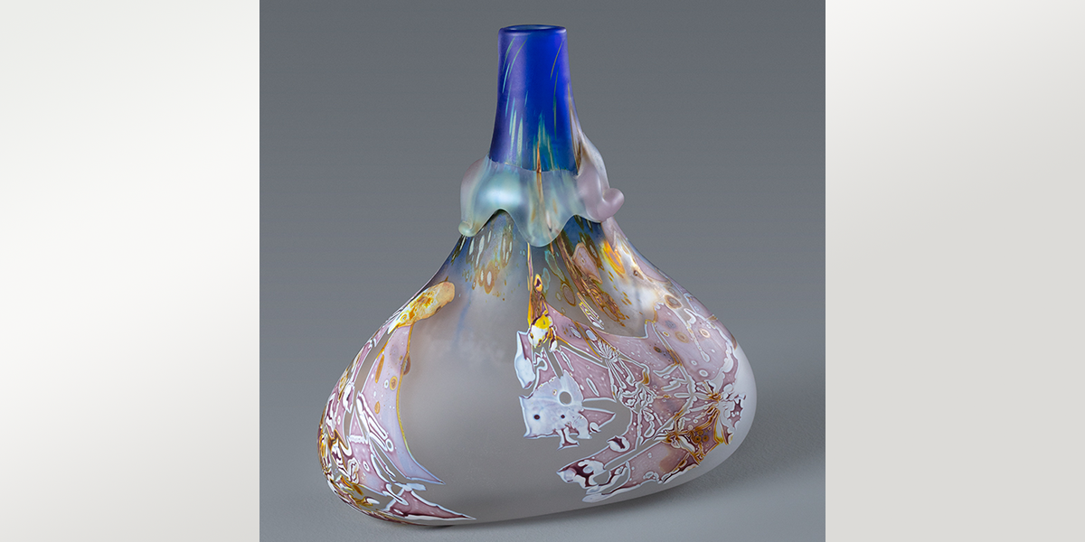 bottle form made of blown glass with hot glass applications blue neck and pink and amber patterns