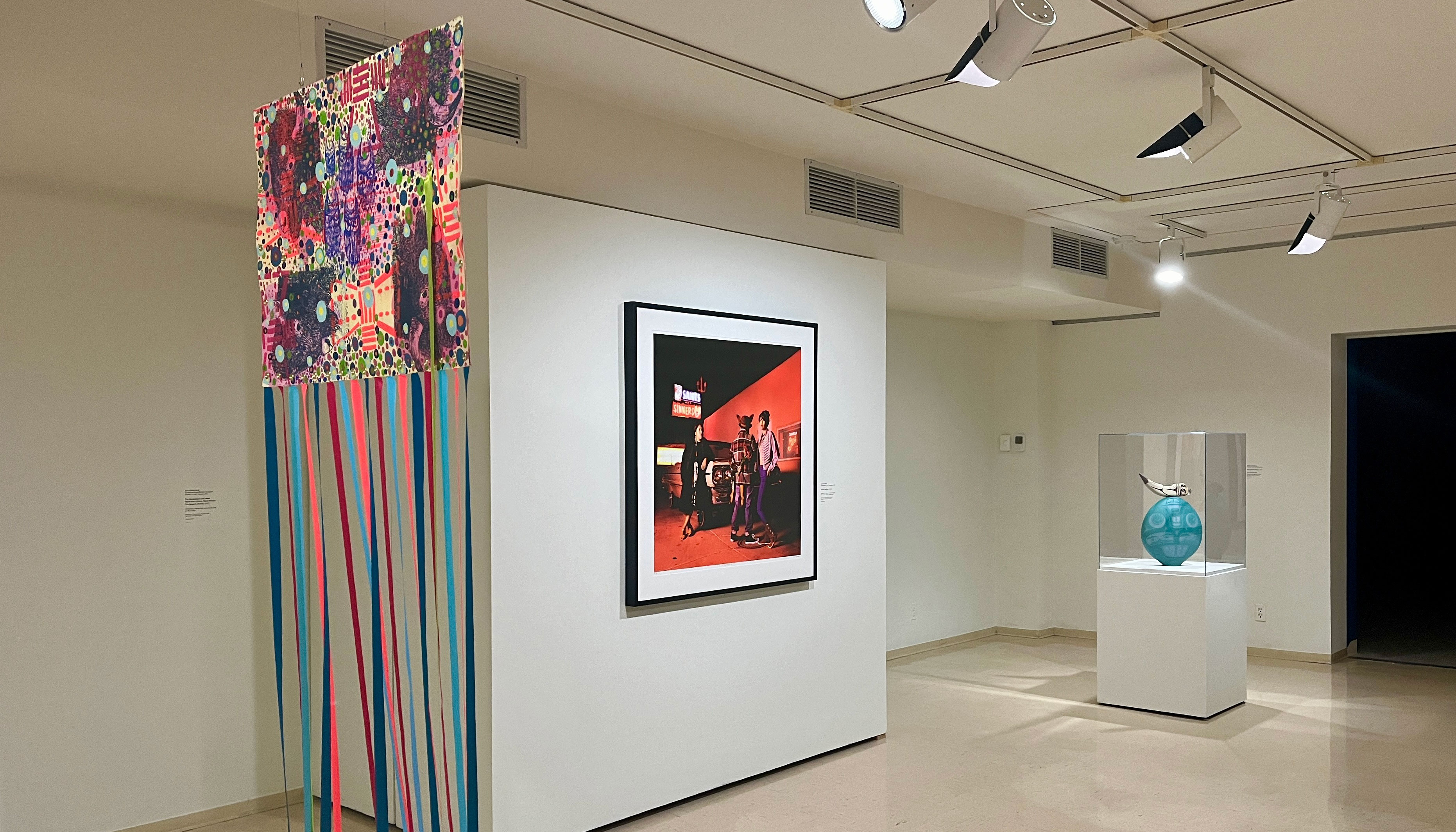 Image of a corner of the gallery featuring work by Harriet Bart.