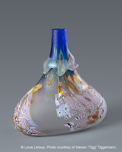 An irregularly shaped glass bottle