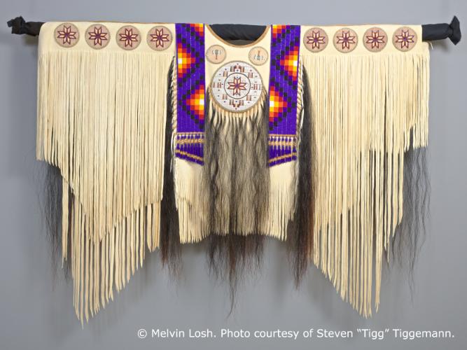 A Native American fringed leather shirt.