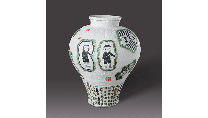 ceramic vase form with illustrated people and other motifs